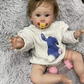 “Maisie” – 24 Inch Reborn Baby Girl Doll Hand-Rooted Hair Soft Cloth Body