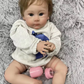 “Maisie” – 24 Inch Reborn Baby Girl Doll Hand-Rooted Hair Soft Cloth Body